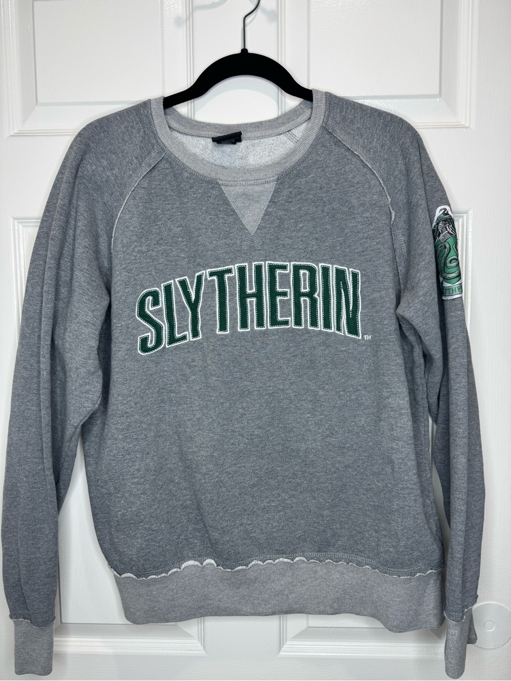 Warner Bros. Gray Crewneck Sweatshirt with Green Slytherin Lettering